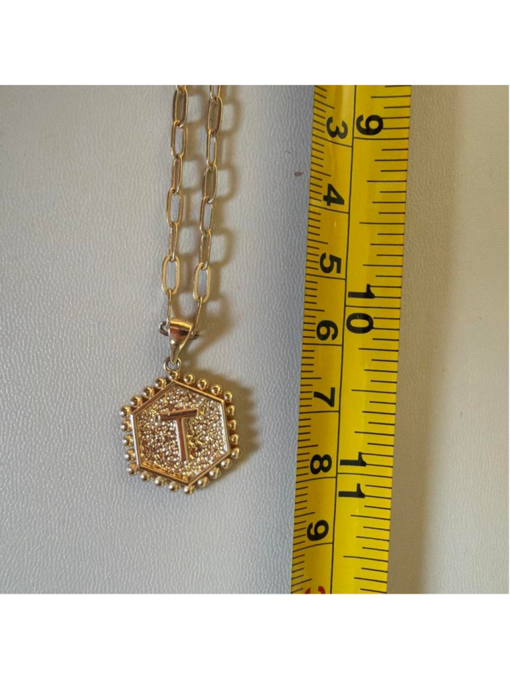 Gold plated “T” initial necklace with sparkle accents
